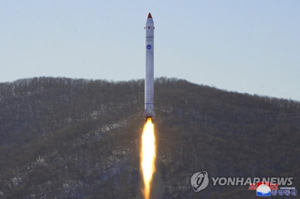 This file photo, carried by North Korea's official Korean Central News Agency on Dec. 19, 2022, shows the North firing a vehicle carrying a 
