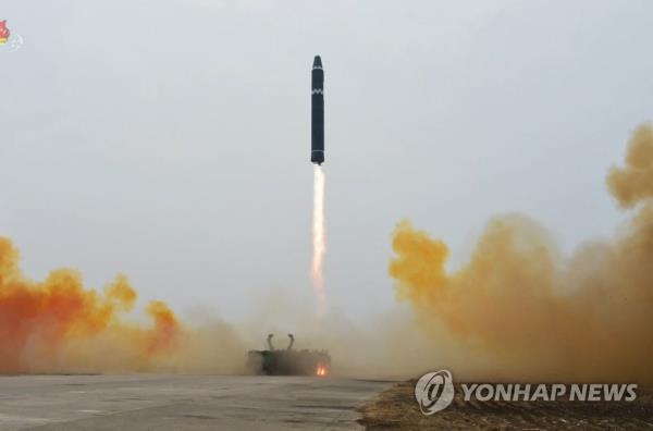 This photo, carried by North Korea's official Korean Central News Agency on Feb. 19, 2023, shows the North's firing of a Hwasong-15 interco<em></em>ntinental ballistic missile at a lofted angle the previous day. (For Use o<em></em>nly in the Republic of Korea. No Redistribution) (Yonhap)