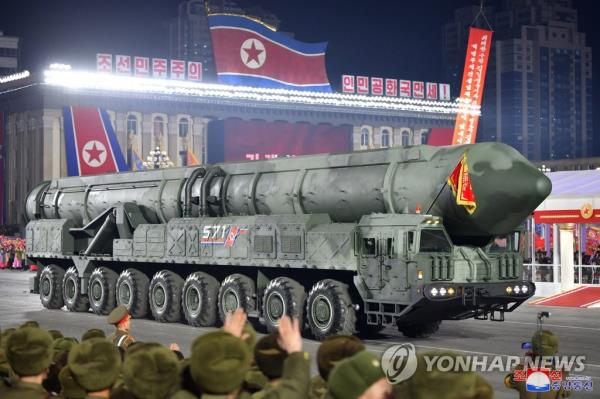 This photo, carried by North Korea's official Korean Central News Agency on Feb. 9, 2023, shows the North displaying what was presumed to be a solid-fuel interco<em></em>ntinental ballistic missile during a military parade held at Kim Il Sung Square the previous day. (For Use o<em></em>nly in the Republic of Korea. No Redistribution) (Yonhap)
