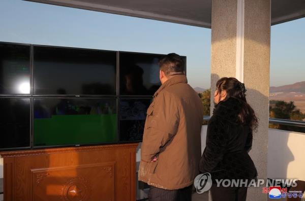 North Korean leader Kim Jong-un (L), alo<em></em>ngside his daughter Ju-ae, inspects the test-firing of a Hwasong-17 interco<em></em>ntinental ballistic missile on March 16, 2023, in this photo released by the North's official Korean Central News Agency the following day. (For Use o<em></em>nly in the Republic of Korea. No Redistribution) (Yonhap)