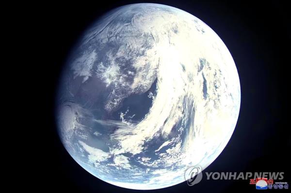 This photo, carried by North Korea's official Korean Central News Agency (KCNA) on March 17, 2023, shows an image of Earth apparently shot from space. The North claimed to have test-fired a Hwasong-17 interco<em></em>ntinental ballistic missile from the Sunan area in Pyo<em></em>ngyang the previous day. (For Use o<em></em>nly in the Republic of Korea. No Redistribution) (Yonhap)