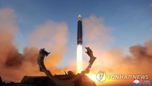 This photo, carried by North Korea's official Korean Central News Agency (KCNA) on March 17, 2023, shows the North firing a Hwasong-17 interco<em></em>ntinental ballistic missile from the Sunan area in Pyo<em></em>ngyang the previous day. (For Use o<em></em>nly in the Republic of Korea. No Redistribution) (Yonhap)