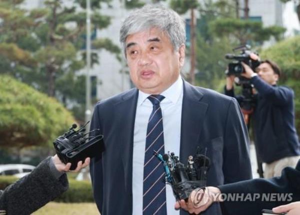 Korea Communications Commission Chairman Han Sang-hyuk appears before the Seoul Northern District Prosecutors Office on March 22, 2023. (Yonhap)