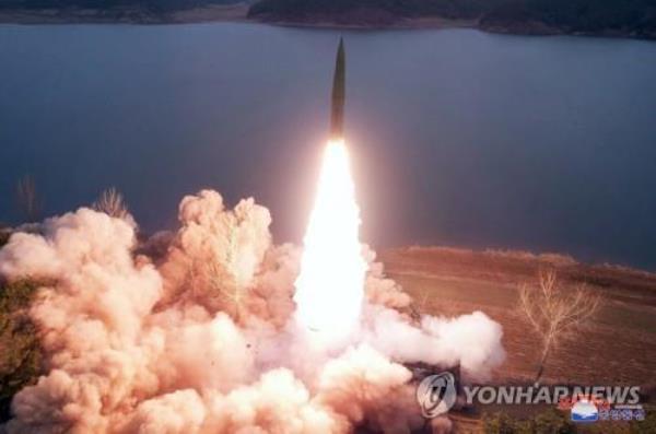 This photo, carried by North Korea's official Korean Central News Agency on March 15, 2023, shows the North firing two ground-to-ground ballistic missiles from Jangyon, South Hwanghae Province, the previous day. (For Use o<em></em>nly in the Republic of Korea. No Redistribution) (Yonhap)