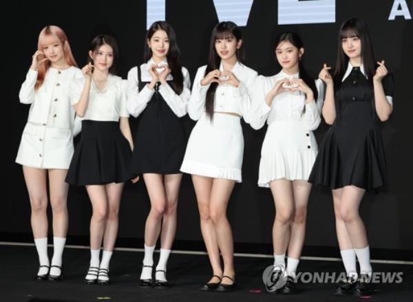 K-pop girl group Ive poses for the camera during a press co<em></em>nference held at a Seoul hotel on April 10, 2023, to mark the release of its first full-length album, 