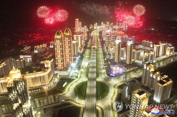 This photo, carried by North Korea's official Korean Central News Agency on April 17, 2023, shows a nighttime image of 10,000 newly built homes in the Hwasong district of Pyongyang. (For Use o<em></em>nly in the Republic of Korea. No Redistribution) (Yonhap)