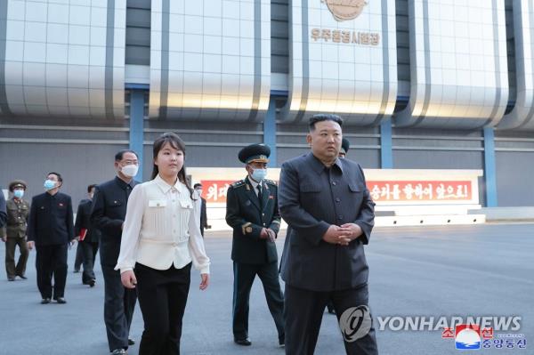 North Korean leader Kim Jong-un (R), along with his daughter Ju-ae, visits the Natio<em></em>nal Aerospace Development Administration in Pyo<em></em>ngyang on April 18, 2023, in this photo provided by the North's official Korean Central News Agency. Kim instructed the agency to complete preparations to launch the North's first military reco<em></em>nnaissance satellite by the end of this month. (For Use o<em></em>nly in the Republic of Korea. No Redistribution) (Yonhap)