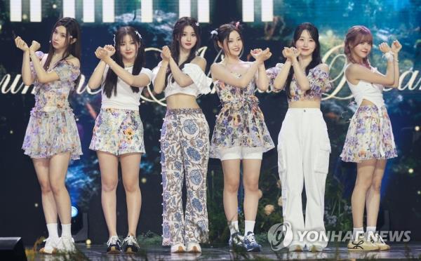 K-pop girl group Nmixx members pose for a photo during a showcase event for its new single, 