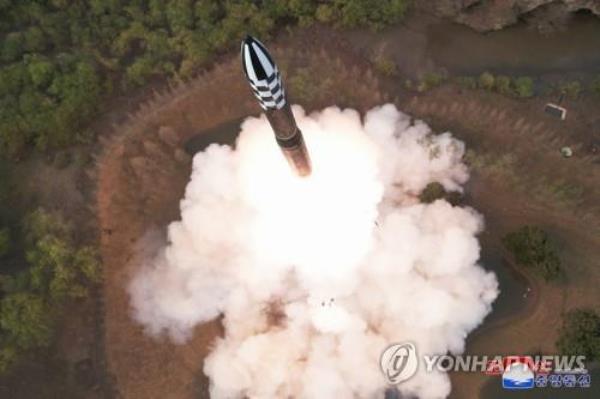 This photo, provided by North Korea's official Korean Central News Agency on April 14, 2023, shows the North's new solid-fuel Hwasong-18 interco<em></em>ntinental ballistic missile (ICBM), test-fired the previous day under the guidance of North Korean leader Kim Jong-un. (For Use o<em></em>nly in the Republic of Korea. No Redistribution) (Yonhap)