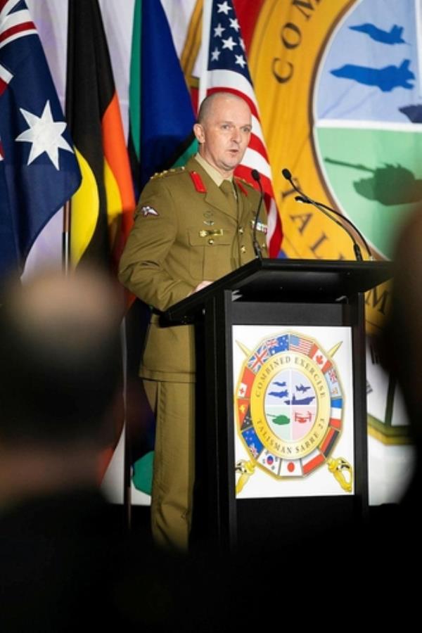 This photo, provided by the Australian government, shows Brigadier Damian Hill, exercise director of Talisman Sabre 2023, speaking at the opening ceremony for the drills in Sydney on July 21, 2023. (PHOTO NOT FOR SALE) (Yonhap)