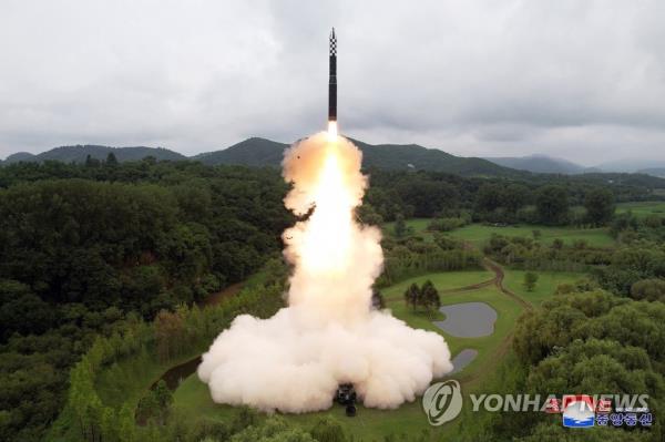 This photo, carried by North Korea's Korean Central News Agency on July 13, 2023, shows the North's firing of a Hwasong-18 solid-fuel interco<em></em>ntinental ballistic missile the previous day. (For Use o<em></em>nly in the Republic of Korea. No Redistribution) (Yonhap)