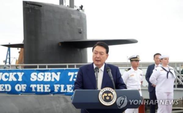 President Yoon Suk Yeol delivers a speech during a visit to the USS Kentucky, a nuclear-powered ballistic missile submarine, docking at the South Korean naval operations ba<em></em>se in Busan, southeast of Seoul, on July 19, 2023. (Pool photo) (Yonhap)