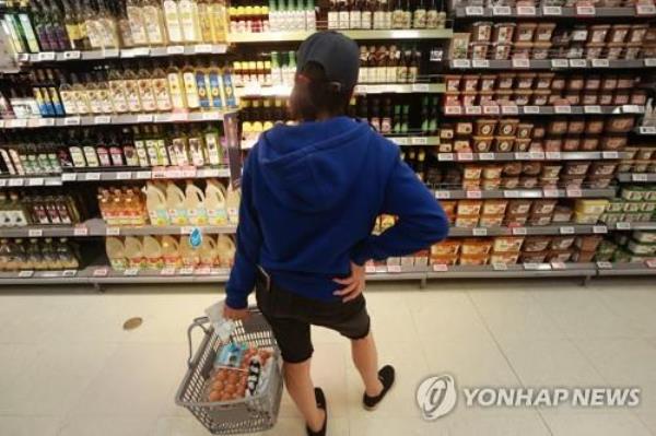 In this file photo, a shopper browses products at a supermarket in Seoul on May 2, 2023. (Yonhap)