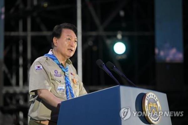 President Yoon Suk Yeol delivers a welcoming speech during the opening ceremony of the 25th World Scout Jamboree in Saemangeum, a<em></em>bout 180 kilometers southwest of Seoul, on the night of Aug. 2, 2023, in this photo provided by the presidential office. (PHOTO NOT FOR SALE) (Yonhap)