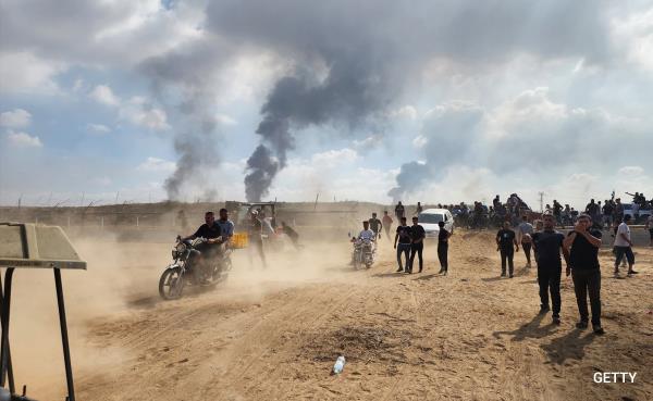 Israel was caught off guard when Hamas launched its devastating attack, enabling a force using bulldozers, hang gliders and motorbikes to take on the Middle Easts most powerful army. In the pic, the Hamas fighters are seen taking down the fence on the Israel-Gaza border and entering Israel.