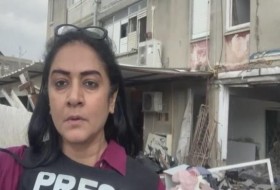 NDTV地面报道:在以色列的亚实基伦，第一个房屋被哈马斯火箭击中
