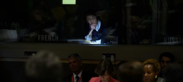 A UN interpreter works during a debate on internatio<em></em>nal humanitarian law.