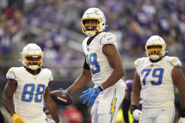 Chargers tight end Do<em></em>nald Parham Jr. celebrates after catching a 1-yard touchdown pass.